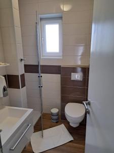 Koupelna v ubytování Rooms & Apartment Mama Mia