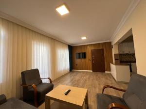 TV a/nebo společenská místnost v ubytování Sırma Family Apart Hotel