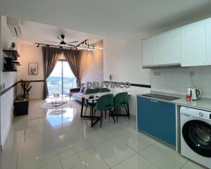a kitchen and living room with a table and chairs at Continew Residensi 2bedroom for 5pax with TRX View in Kuala Lumpur