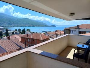 a balcony with a view of a lake at Villa Bella in Ohrid