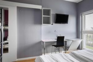Μια τηλεόραση ή/και κέντρο ψυχαγωγίας στο Aiden by Best Western Skavsta Airport