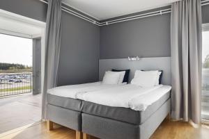 Ένα ή περισσότερα κρεβάτια σε δωμάτιο στο Aiden by Best Western Skavsta Airport