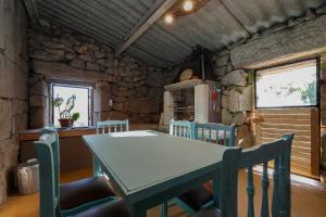 Φωτογραφία από το άλμπουμ του A Casa do Ferreiro στην Ποντεβέντρα