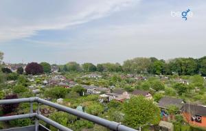 Vistas a una ciudad con casas y árboles en BEGE APARTMENTS Executive Lodgings, en Duisburg