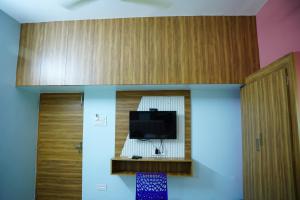TV a/nebo společenská místnost v ubytování Park View Residency