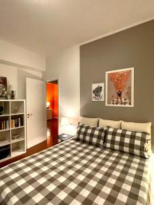 Säng eller sängar i ett rum på La Casa di Simo Appartamento con terrazzo