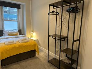 Кровать или кровати в номере Two bed apartment