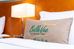 Ένα ή περισσότερα κρεβάτια σε δωμάτιο στο Belle Vue Building