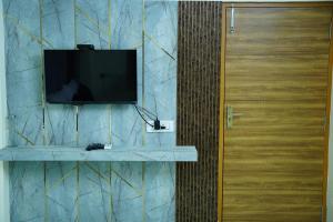 TV a/nebo společenská místnost v ubytování Park View Residency