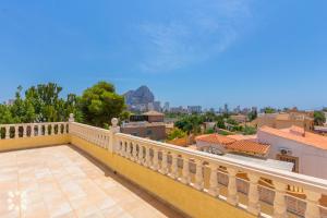 a balcony with a view of the mountains at Villa Delicia by Abahana Villas in Calpe
