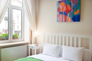 Postel nebo postele na pokoji v ubytování Danylo Inn