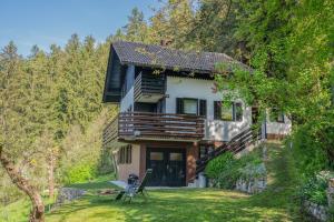 a house in the middle of a forest at Hiška Gmajna in Slovenj Gradec
