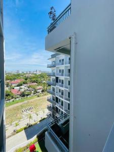 a view from the balcony of a building at WV 10 Stylish 1BR Apartment in Iloilo City +9 photos