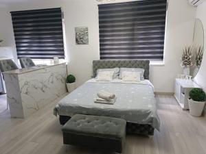 Postel nebo postele na pokoji v ubytování Stan u centru