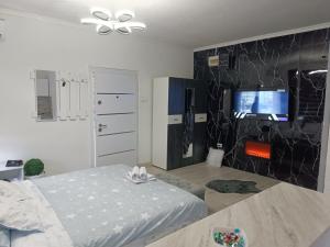 Postel nebo postele na pokoji v ubytování Stan u centru