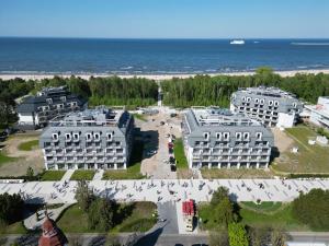 an aerial view of a resort near the ocean at Platino Mare Resort & Spa in Świnoujście