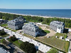 an aerial view of buildings at the beach at Platino Mare Resort & Spa in Świnoujście