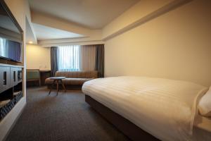 Katil atau katil-katil dalam bilik di Dormy Inn Morioka +49 gambar