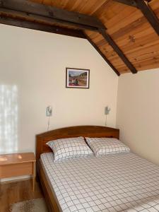 Postel nebo postele na pokoji v ubytování Apartment Tarski konaci