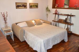 Postel nebo postele na pokoji v ubytování Apartamentos Nuncio Viejo