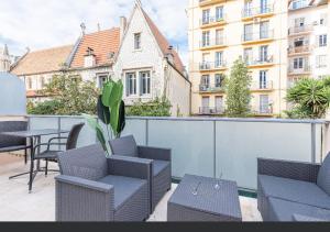 Posezení v ubytování Beau deux pièces cozy avec terrasse n11