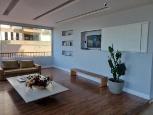 Uma área de estar em Flat Casa del Mar Barra da Tijuca