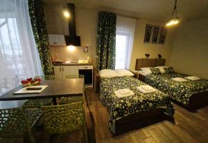 Posteľ alebo postele v izbe v ubytovaní Tajemniczy Ogród Szczytna - Bed & Breakfast