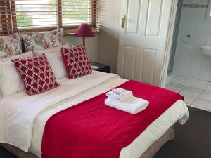 Ένα ή περισσότερα κρεβάτια σε δωμάτιο στο Jopasso Guest House +12 φωτογραφίες