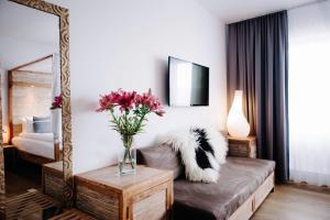 Postel nebo postele na pokoji v ubytování Eyja Guldsmeden Hotel