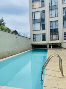 Bazén v ubytování vibes by T one bedroom apartment in Rongai with a pool nebo v jeho okolí