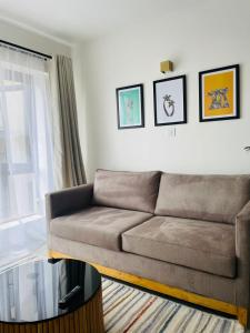 Posezení v ubytování vibes by T one bedroom apartment in Rongai with a pool
