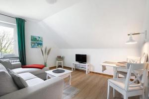 TV a/nebo společenská místnost v ubytování Hoern 1