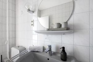 Koupelna v ubytování Hoern 1 + 16 fotografií