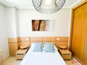 Postel nebo postele na pokoji v ubytování La Joya de Azahar