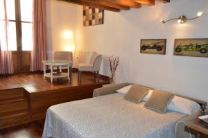Postel nebo postele na pokoji v ubytování Apartamentos Nuncio Viejo