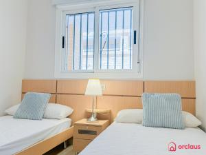 Postel nebo postele na pokoji v ubytování La Joya de Azahar