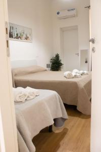 Posteľ alebo postele v izbe v ubytovaní Guest House Civico 513 Casa Vacanze Reggio Calabria