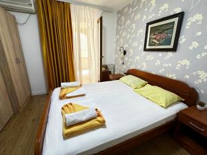 Ліжко або ліжка в номері CENTRAL HOTEL-Budva