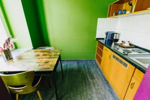 Kuchyň nebo kuchyňský kout v ubytování Boutique Hotel Rothenburger Hof