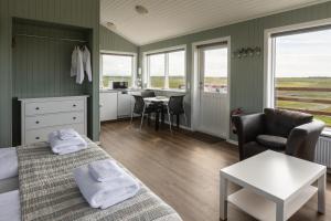 Giường trong phòng chung tại Hestheimar