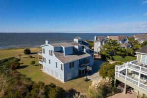 an aerial view of a house and the ocean at B20 Bay Meadow 20 in Nags Head