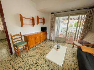 TV a/nebo společenská místnost v ubytování Apartamentos Gandia-Daimuz 3000