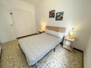 Postel nebo postele na pokoji v ubytování Apartamentos Gandia-Daimuz 3000