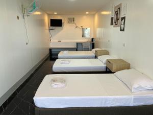Postel nebo postele na pokoji v ubytování MAMORI HOTEL