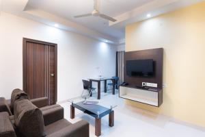TV a/nebo společenská místnost v ubytování Itsy Hotels Worldtree