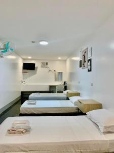 Postel nebo postele na pokoji v ubytování MAMORI HOTEL