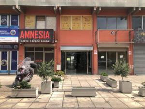 a motorcycle parked in front of a building at Limani's Sea View Deluxe in Thessaloniki