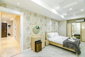 Кровать или кровати в номере Park Azure Luxury apartment by Baku Housing +37 фотографий