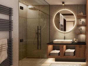 a bathroom with a sink and a shower at Hotel Pachmair - Im Herzen des Zillertal's in Uderns