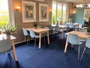 Posezení v ubytování Hotel Dichtbijzee